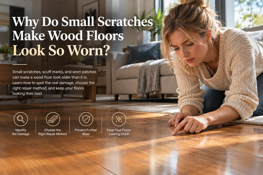 Woman inspecting small scratches on a wood floor in a sunlit living room